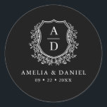 Black White Crest Modern Monogram Wedding  Classic Round Sticker<br><div class="desc">Add a timeless and elegant touch to your wedding with the Black White Crest Modern Monogram Wedding Classic Round Sticker. Featuring a sleek black background, a refined white crest design, and a personalised monogram, this sticker is perfect for enhancing your wedding invitations, favours, or stationery. Its minimalist yet sophisticated design...</div>