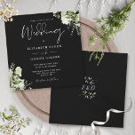 Black White Greenery Monogram Square Wedding Invitation<br><div class="desc">This elegant botanical greenery leaves wedding invitation can be personalised with your information in chic typography with your monogram initials on the reverse. Designed by Thisisnotme©</div>