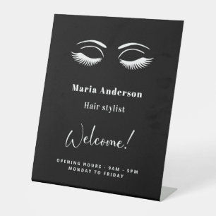 Black white makeup artist opening hours welcome pedestal sign