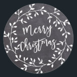 Black White Merry Christmas Chalkboard Wreath Classic Round Sticker<br><div class="desc">Chic and contemporary white wreath on black chalkboard creates a fresh and modern Christmas envelope seal. Merry Christmas is written in a hip and trendy font that complements the wreath perfectly.</div>