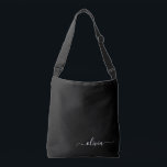 Black White Modern Minimalist Elegant Monogram Crossbody Bag<br><div class="desc">Introducing our Black and White Minimalist Modern Monogram Collection: Embrace simplicity and sophistication with our minimalist designs, curated to elevate your style effortlessly. Crafted with a keen eye for modern aesthetics, this collection features sleek black and white designs accentuated by personalised monograms. From chic stationery to versatile accessories, our collection...</div>