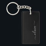 Black White Modern Minimalist Elegant Monogram Key Ring<br><div class="desc">Introducing our Black and White Minimalist Modern Monogram Collection: Embrace simplicity and sophistication with our minimalist designs, curated to elevate your style effortlessly. Crafted with a keen eye for modern aesthetics, this collection features sleek black and white designs accentuated by personalised monograms. From chic stationery to versatile accessories, our collection...</div>
