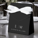 Black White Modern Minimalist Monogram Name Favour Box<br><div class="desc">Elevate your event's favours with our Classic Elegant Modern Minimalist Monogram Favour Box. Meticulously designed, these favour boxes seamlessly blend timeless sophistication with contemporary minimalism, making them a stylish and memorable addition to your celebration. Crafted with precision and attention to detail, these favour boxes are more than just containers; they...</div>