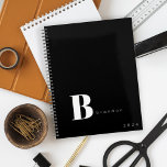 Black white monogram initial name business 2025 planner<br><div class="desc">Simple elegant minimal initial letter and name personalised solid black and white yearly planner notebook.</div>