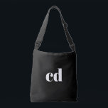 Black white monogram initials modern crossbody bag<br><div class="desc">A classic chic black background. Personalise and add your monogram initials written with white block letters. Modern,  trendy and simple.</div>