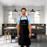 Black white monogram name business apron<br><div class="desc">A stylish black background. Personalise and add your monogram initials and name. Modern block letters.</div>