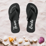 Black White Name Bride Bridal Party Bachelorette Flip Flops<br><div class="desc">A simple black and white minimalist typography design for a bridal shower, bachelorette party or beach wedding. The text is customisable and can be personalised with your own name and bride slogan. For example, Bride Squad instead of Team Bride, Bride repeated on the left and right foot, or something else....</div>