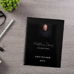 Black white name signature photo business 2025 planner<br><div class="desc">A classic black background. Personalise and add your photo,  name and title or a text. Modern,  trendy and simple. For both him and her. 
Back: add your business logo,  web address (or delete)</div>