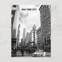 Black white photo New York City buildings cars
