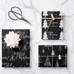 Black White Script Merry Christmas Tree Name  Wrapping Paper Sheet<br><div class="desc">Beautiful and elegant black and white Merry Christmas wrapping paper set is perfect for those who like a simple and minimalist aesthetic. The  Christmas trees have a tiny gold star. So pretty with the hand written script typography. Add your name or family name to personalise one of the sheets.</div>