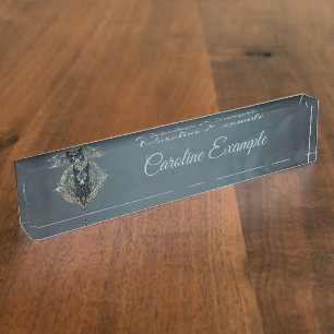 Black wolfs head with piercing blue eyes, nameplate