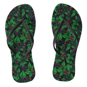 Blackberries on dark grey flip flops