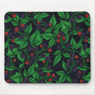 Blackberries on dark grey mouse mat