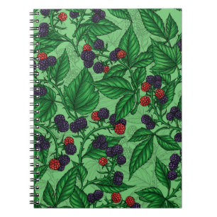 Blackberries on green notebook