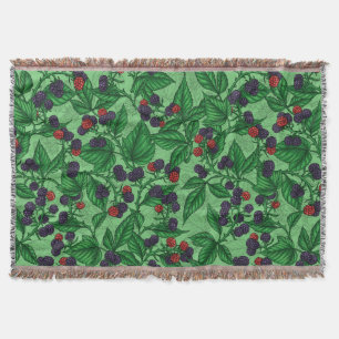 Blackberries on green throw blanket