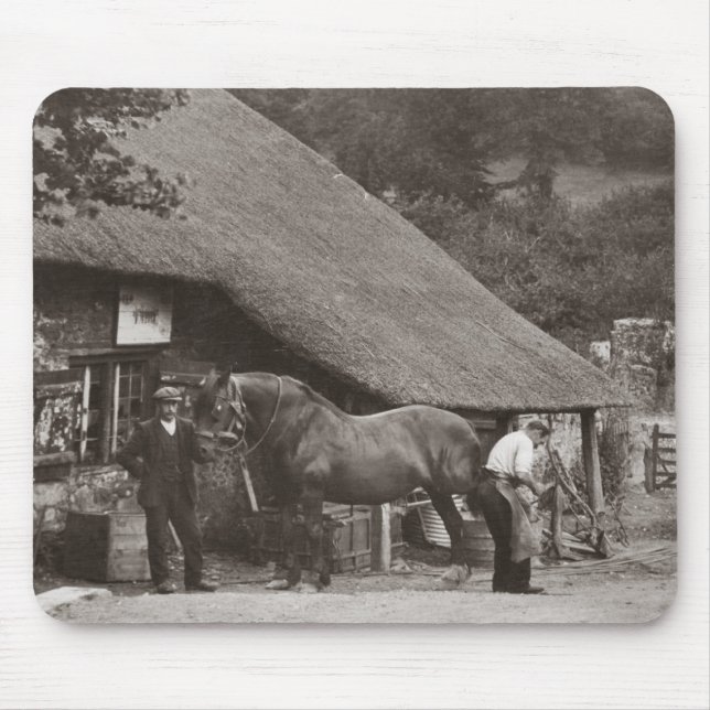 Blacksmith shoeing a horse mouse mat (Front)