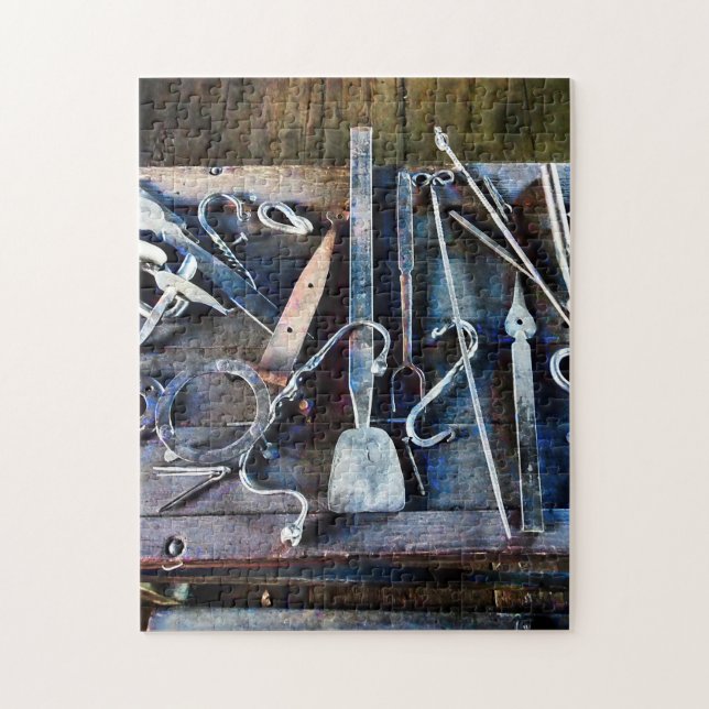 Blacksmith Tools on Table Jigsaw Puzzle (Vertical)
