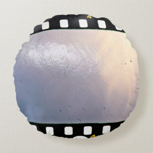 Blank 35mm film frame or strip on white background round cushion