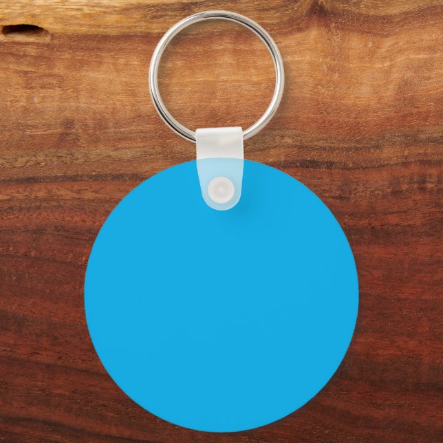 Blank Blue Circular Keychain Tag on Wood Surface (Back)