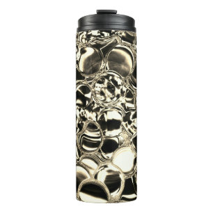 Blebs of gold or bubbles of glass? thermal tumbler