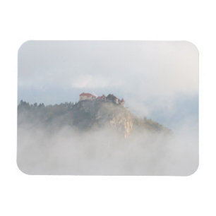 Bled castle surrounded by clouds magnet