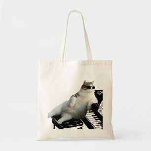 Blind cat pianist tote bag
