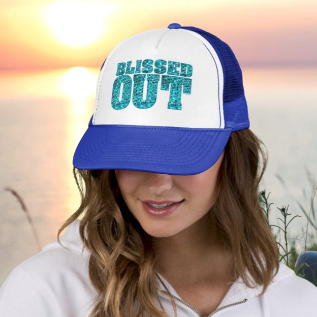 Blissed Out Trucker Hat – Yoga Spiritual Style (Woman in Royal and White Trucker Hat with faux snakeskin "Blissed Out" teal letters)