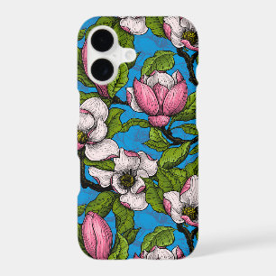 Blooming magnolia on blue