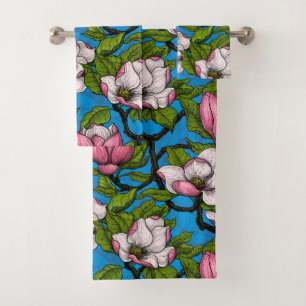 Blooming magnolia on blue bath towel set