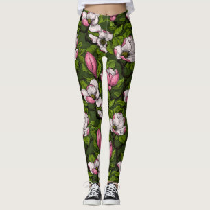 Blooming magnolia on dark green leggings
