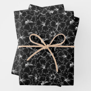 Blooming White Hibiscus Flowers on Black Wrapping Paper Sheet