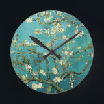 Blossoming Almond Tree Vincent Van Gogh Round Clock<br><div class="desc">This is the oil painting "Blossoming Almond Tree" done in 1890 by Dutch post- impressionist artist Vincent Willem van Gogh (1853-1890).    It is our Fine Art Series no. 113.</div>