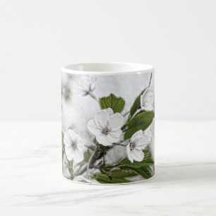 Blossoming branch of cherry tree in orchard coffee mug