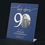 Blue 90th Birthday Welcome Sign | Look Who's 90<br><div class="desc">Welcome guests to your 90th birthday celebration with this stunning editable welcome sign. Featuring a sleek, customizable layout, this template allows you to easily add your own photo and personalize the text, making it a perfect addition to your milestone 90th birthday decor. Ideal for entryways or as a party focal...</div>