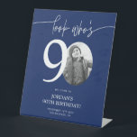Blue 90th Birthday Welcome Sign | Look Who's 90<br><div class="desc">Welcome guests to your 90th birthday celebration with this stunning editable welcome sign. Featuring a sleek, customizable layout, this template allows you to easily add your own photo and personalize the text, making it a perfect addition to your milestone 90th birthday decor. Ideal for entryways or as a party focal...</div>