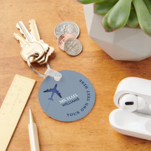 blue aeroplane keychain with name