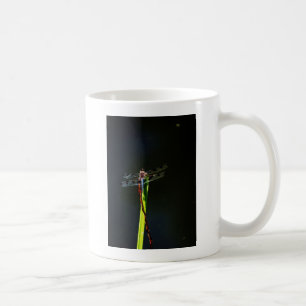 Blue and black  Dragonfly on green and red grass Coffee Mug