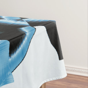 Blue and black scraps or ribbons being destroyed tablecloth
