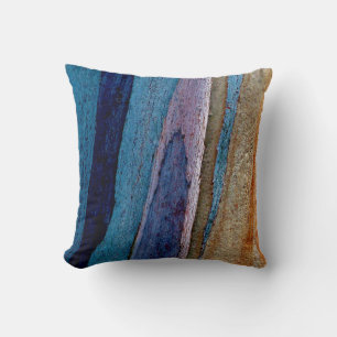 Blue and brown painted surface cushion