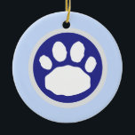 Blue and Grey Paw Print Ceramic Tree Decoration<br><div class="desc">This round keepsake ornament features a large animal paw print in colours inspired by the Hanukkah season. Make it uniquely yours by adding a name or your customised message. See more gift ideas for your favourite four-legged friends and their pet parents at zazzle.com/paws_for_celebration . Pin or bookmark this page to...</div>
