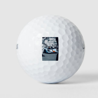Blue and orange race car golf balls