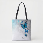 Blue and Silver Watercolor Butterflies Tote Bag<br><div class="desc">Create your own beautiful personalised butterfly tote bags using an elegant DIY template. Easily add your name or a custom quote in elegant calligraphy script on the front, and a monogram letter / initials to the back. The rustic watercolor artwork created by Raphaela Wilson depicts a graceful flying arch of...</div>