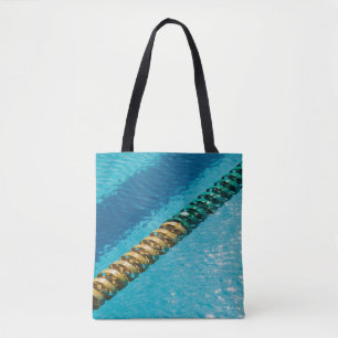 Blue and white beaded necklace on blue body of wat tote bag