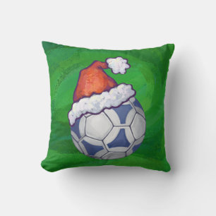 Blue and White Festive Soccer Ball on Green Cushion