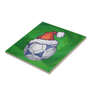 Blue and White Festive Soccer Ball on Green Tile