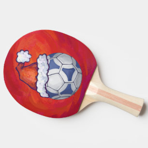 Blue and White Festive Soccer Ball on Red Ping Pong Paddle