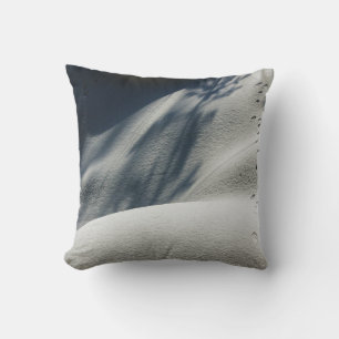 Blue and white floral textile cushion