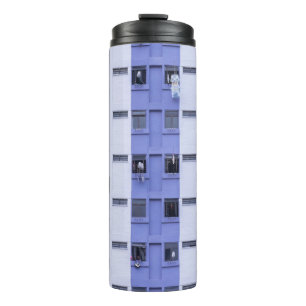 Blue and white high-rise building thermal tumbler