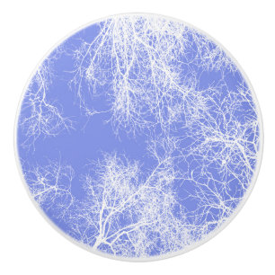 Blue and white silhouetted trees ceramic knob