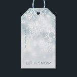Blue and White Winter Snow Gift Tags<br><div class="desc">This gift tag features a soft dusty blue background with softly falling white snowflakes. Personalise it with your family name and the year. Perfect for Christmas or Hanukkah gifts. Created by Simply Farmhouse Press.</div>